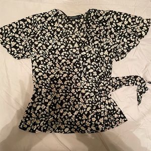 Black wrap top with white and red flowers